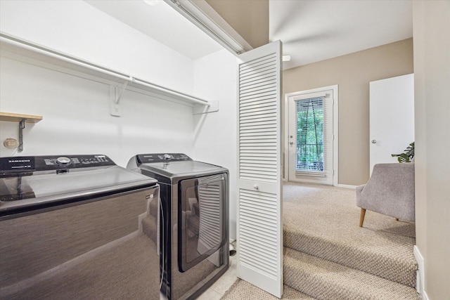 1244 W 18th St, Houston, TX 77008 - clothes washing area with light carpet, washing machine and dryer, and baseboards