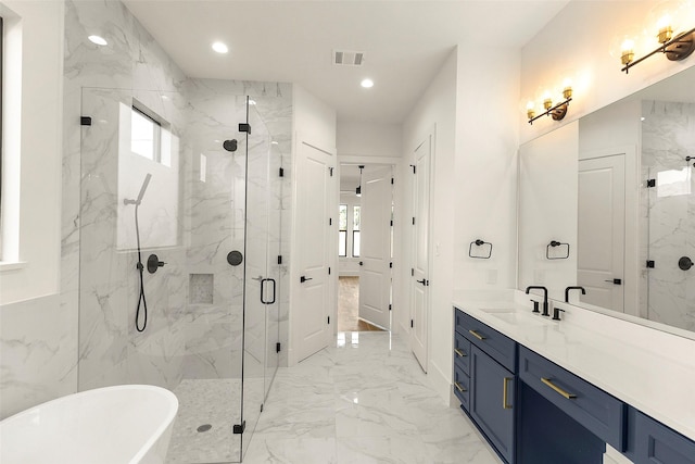 1038 W 31st St, Houston, TX 77018 - full bath featuring marble tiled floors, a marble finish shower, a soaking tub, vanity, and recessed lighting