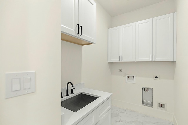 1038 W 31st St, Houston, TX 77018 - laundry area featuring electric dryer hookup, cabinet space, light marble finish flooring, hookup for a washing machine, and gas dryer hookup