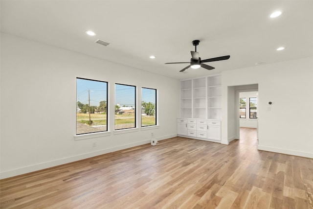 1038 W 31st St, Houston, TX 77018 - spare room with recessed lighting, ceiling fan, light wood-type flooring, and baseboards
