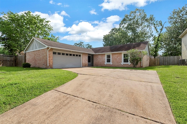 710 Razee Ct, Crosby, TX 77532 - single story home featuring brick siding, a garage, concrete driveway, and cooling unit