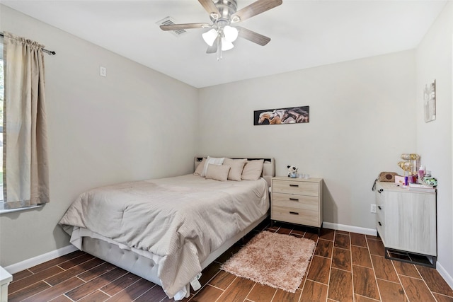 710 Razee Ct, Crosby, TX 77532 - bedroom featuring wood tiled floors and baseboards