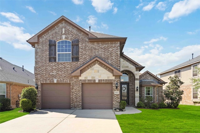 30427 Legacy Pines Dr, Spring, TX 77386 - french country home featuring brick siding, driveway, a front lawn, and a garage