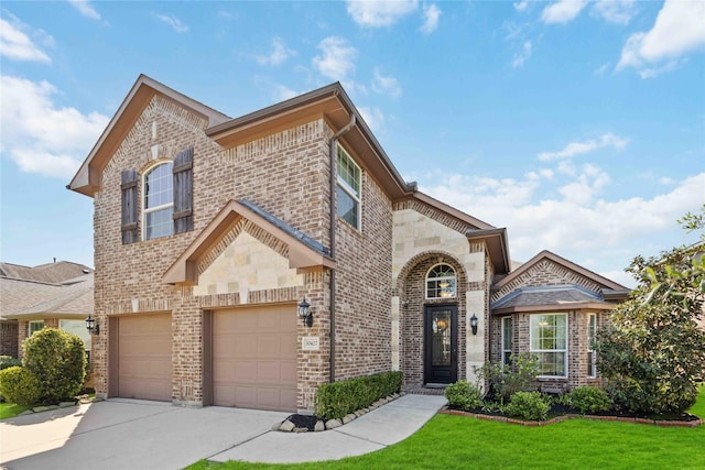 30427 Legacy Pines Dr, Spring, TX 77386 - view of front facade with brick siding, driveway, a garage, and a front lawn