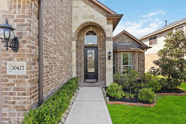 30427 Legacy Pines Dr, Spring, TX 77386 - entrance to property featuring brick siding and a yard