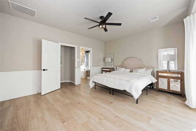 30427 Legacy Pines Dr, Spring, TX 77386 - bedroom with light wood-style flooring, ensuite bath, and ceiling fan
