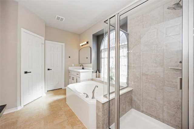 30427 Legacy Pines Dr, Spring, TX 77386 - full bath with a shower stall, a garden tub, vanity, tile patterned flooring, and baseboards