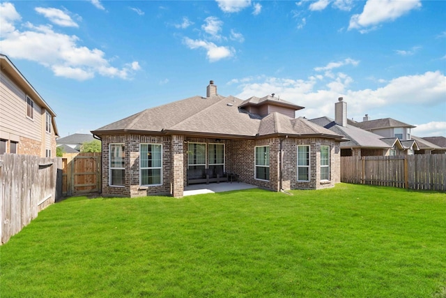 30427 Legacy Pines Dr, Spring, TX 77386 - rear view of property featuring brick siding, a patio, and a shingled roof