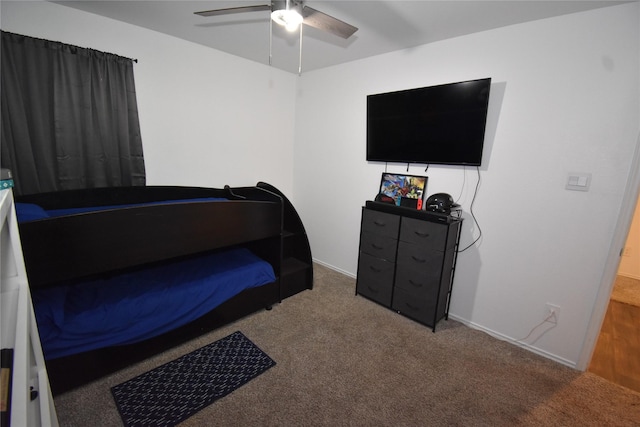 bedroom with carpet flooring, ceiling fan, and baseboards