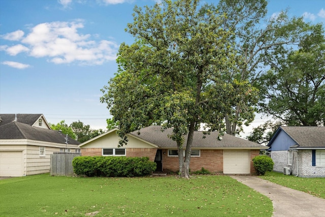 9605 Long Branch Ln, Houston, TX 77055 - view of front facade featuring brick siding, driveway, a garage, and roof with shingles