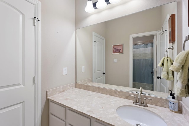 5131 Rowley Falls Ln, Sugar Land, TX 77479 - full bathroom with vanity and a shower with shower curtain