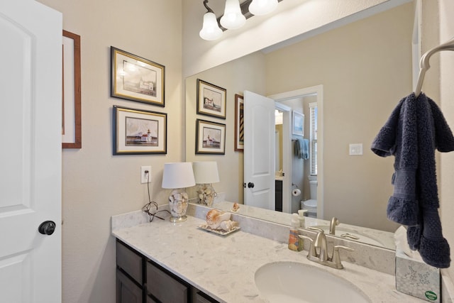 5131 Rowley Falls Ln, Sugar Land, TX 77479 - bathroom featuring toilet and vanity