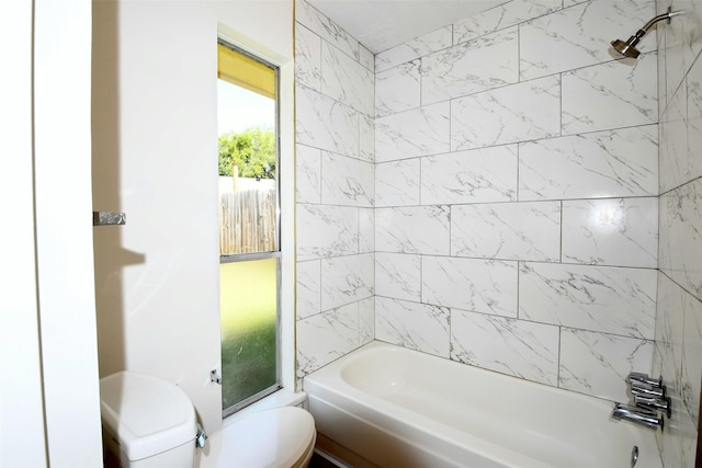18811 Pine Trace Ct, Humble, TX 77346 - bathroom featuring toilet and shower / bathtub combination