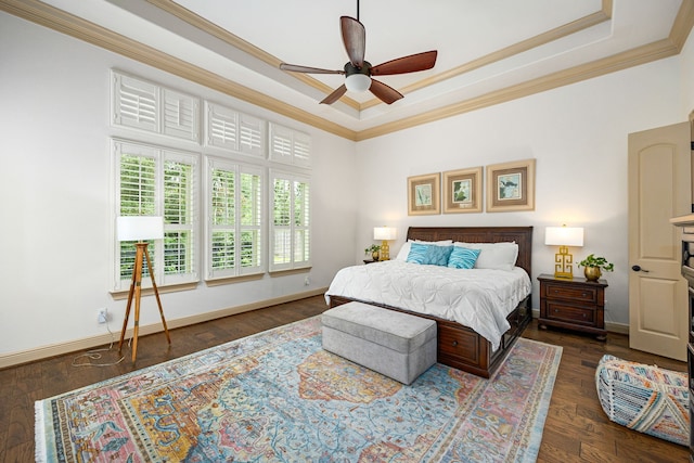 1223 Eversham Way, Kingwood, TX 77339 - bedroom with a raised ceiling, ornamental molding, baseboards, and wood finished floors