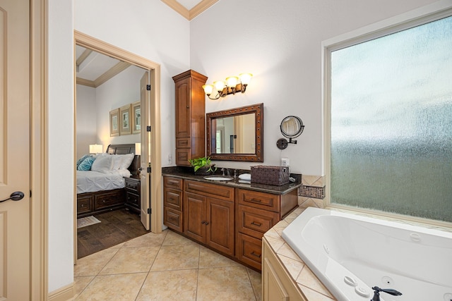 1223 Eversham Way, Kingwood, TX 77339 - ensuite bathroom with ornamental molding, vanity, a bath, tile patterned flooring, and a chandelier