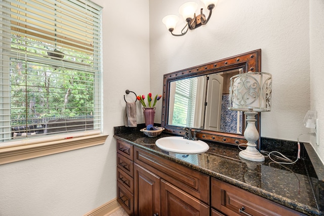 1223 Eversham Way, Kingwood, TX 77339 - bathroom with vanity and a textured wall