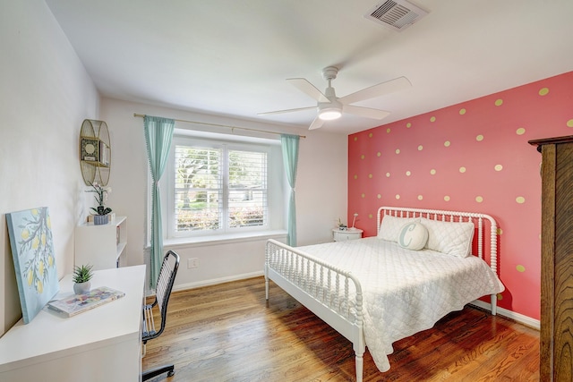 5623 Spellman Rd, Houston, TX 77096 - bedroom with baseboards, light wood finished floors, a ceiling fan, a desk, and wallpapered walls