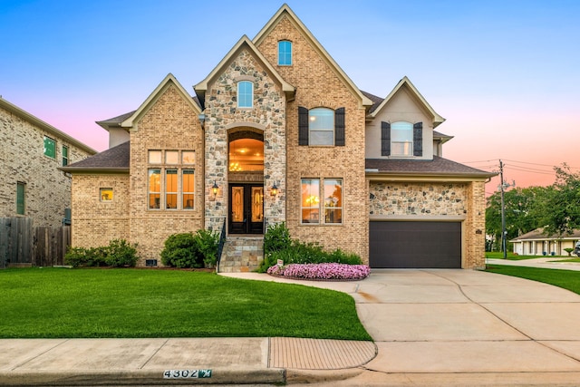 4302 Meyerwood Dr, Houston, TX 77096 - french country style house featuring an attached garage, concrete driveway, roof with shingles, brick siding, and crawl space