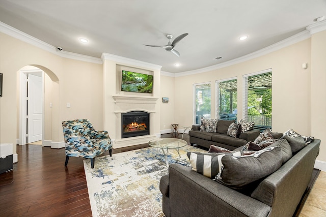 4302 Meyerwood Dr, Houston, TX 77096 - living area featuring arched walkways, crown molding, ceiling fan, recessed lighting, and wood finished floors