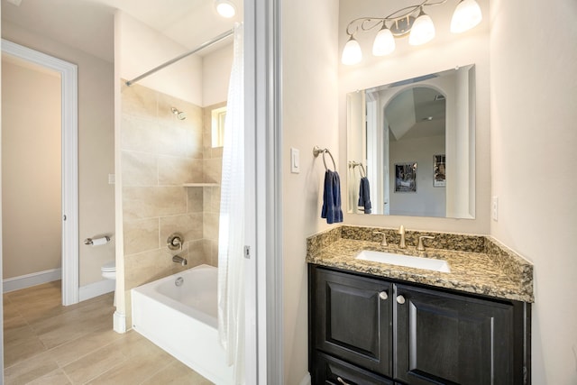 4302 Meyerwood Dr, Houston, TX 77096 - full bathroom with vanity, shower / tub combination, toilet, and baseboards
