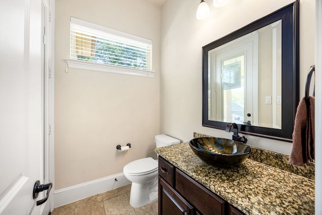 4302 Meyerwood Dr, Houston, TX 77096 - half bathroom with toilet, vanity, and baseboards