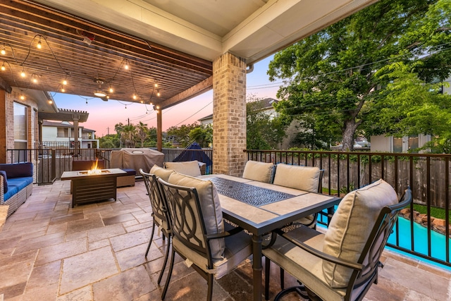 4302 Meyerwood Dr, Houston, TX 77096 - view of patio / terrace with an outdoor living space with a fire pit, grilling area, a fenced backyard, and outdoor dining space