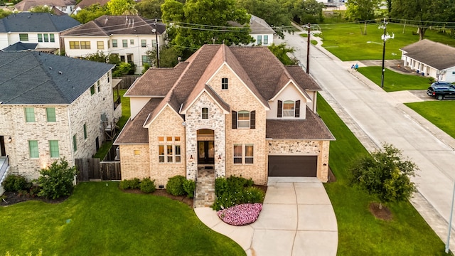 4302 Meyerwood Dr, Houston, TX 77096 - french country style house featuring driveway, brick siding, a residential view, and a shingled roof
