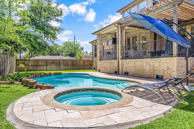 4302 Meyerwood Dr, Houston, TX 77096 - view of swimming pool with a fenced backyard and a pool with connected hot tub