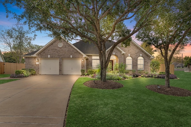 7903 Black Horse Cv, Missouri City, TX 77459 - view of front of house featuring brick siding, a garage, and concrete driveway