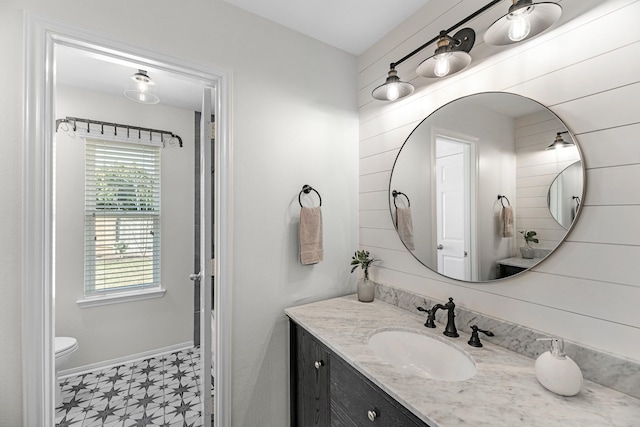 7903 Black Horse Cv, Missouri City, TX 77459 - bathroom with tile patterned floors, vanity, toilet, and baseboards