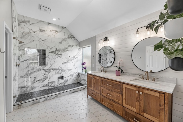 7903 Black Horse Cv, Missouri City, TX 77459 - bathroom featuring lofted ceiling, double vanity, walk in shower, and tile patterned flooring