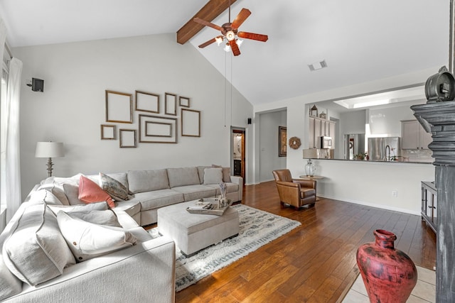 7903 Black Horse Cv, Missouri City, TX 77459 - living area featuring ceiling fan, hardwood / wood-style floors, beamed ceiling, and high vaulted ceiling