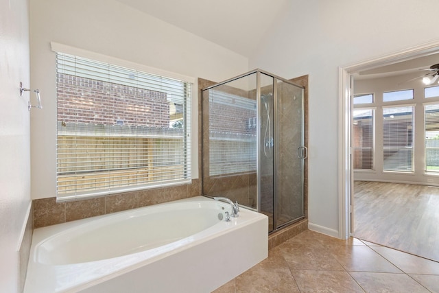 10410 Kingston Creek Ln, Cypress, TX 77433 - bathroom with a stall shower, a garden tub, tile patterned floors, and ceiling fan