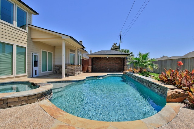10410 Kingston Creek Ln, Cypress, TX 77433 - view of swimming pool with a fenced backyard, a patio area, a pool with connected hot tub, and a gazebo