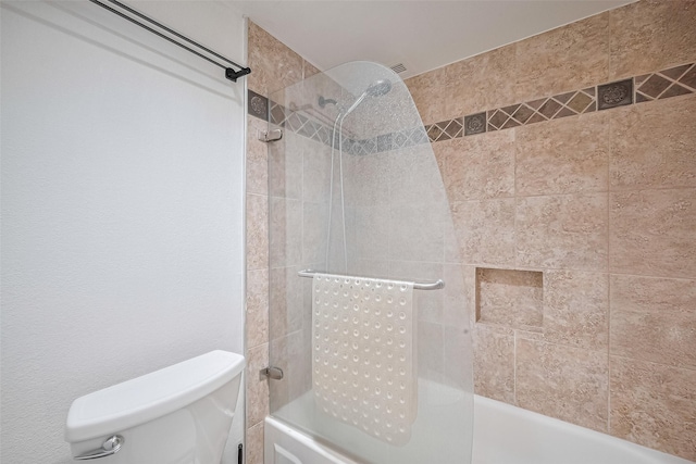 3525 Sage Rd Unit 1004, Houston, TX 77056 - bathroom featuring toilet and washtub / shower combination