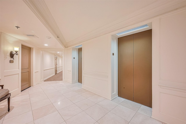 3525 Sage Rd Unit 1004, Houston, TX 77056 - corridor with ornamental molding, elevator, a decorative wall, and light tile patterned floors