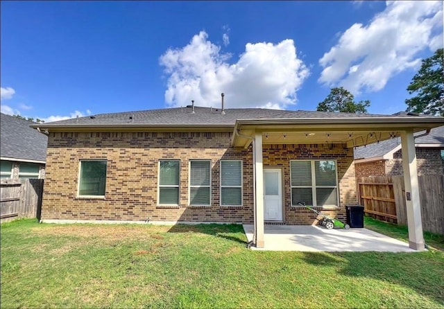 12714 Sweet Root Ln, Humble, TX 77346 - back of house with a patio area and brick siding