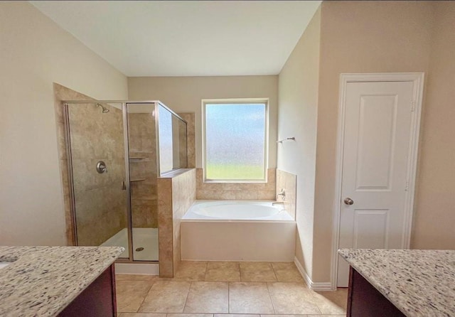 12714 Sweet Root Ln, Humble, TX 77346 - bathroom with a shower stall, vanity, and a garden tub