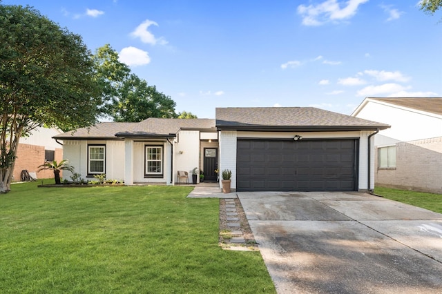 4806 Marburg Ct, Houston, TX 77066 - view of front of property with driveway, an attached garage, and a front lawn