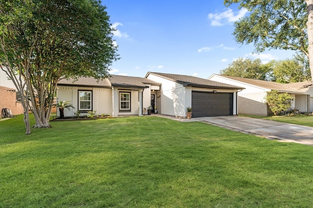 4806 Marburg Ct, Houston, TX 77066 - view of front of property with concrete driveway, a garage, and a front yard