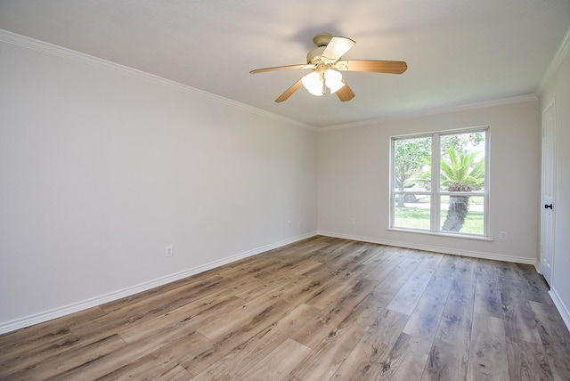 3119 Wagon Trail Dr, Sugar Land, TX 77479 - spare room featuring ornamental molding, wood finished floors, baseboards, and a ceiling fan