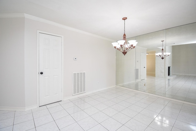 3119 Wagon Trail Dr, Sugar Land, TX 77479 - spare room featuring a chandelier, ornamental molding, light tile patterned flooring, baseboards, and a brick fireplace