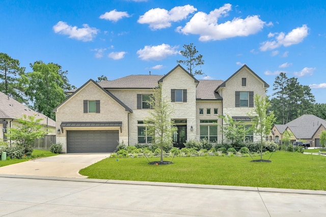 202 Twila Night Ct, Conroe, TX 77318 - view of front of house featuring stone siding, an attached garage, and driveway