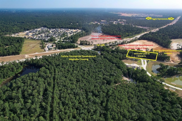 40029 Mill Creek Rd, Magnolia, TX 77354 - view of property location with a heavily wooded area