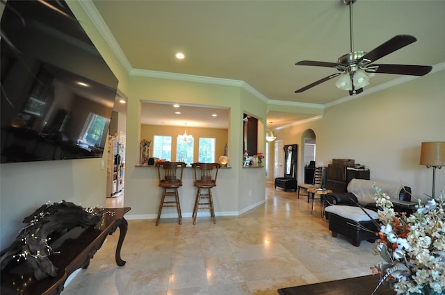 40029 Mill Creek Rd, Magnolia, TX 77354 - living area with arched walkways, crown molding, ceiling fan, recessed lighting, and decorative columns
