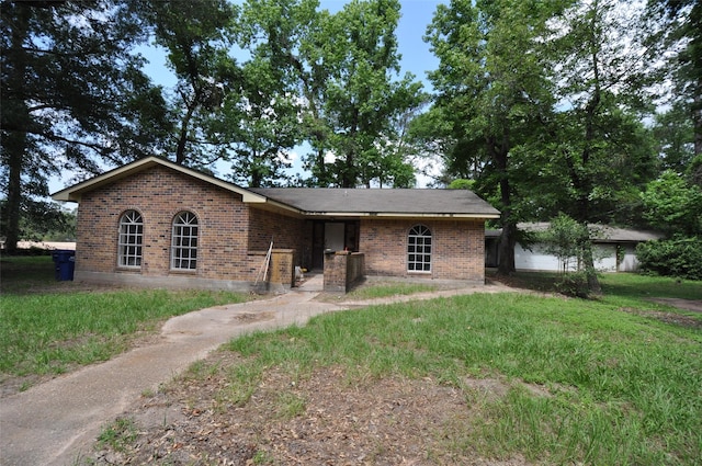 40103 Mill Creek Rd, Magnolia, TX 77354 - single story home featuring brick siding