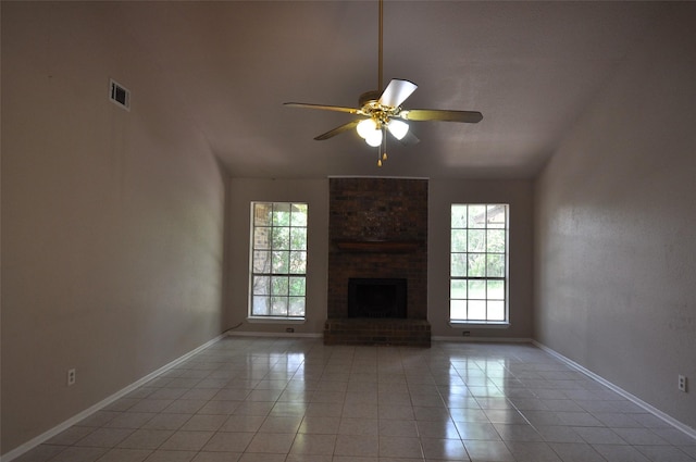 40103 Mill Creek Rd, Magnolia, TX 77354 - unfurnished living room with plenty of natural light, light tile patterned floors, and a ceiling fan