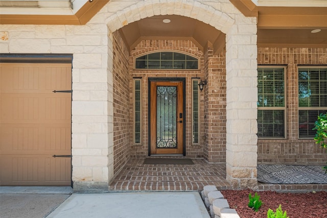 5615 Gemstone Park Rd, Richmond, TX 77407 - view of exterior entry with brick siding and stone siding