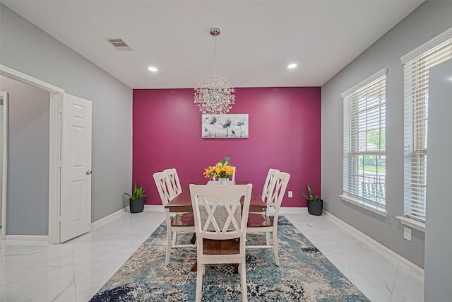 5615 Gemstone Park Rd, Richmond, TX 77407 - dining room with marble finish floors, a chandelier, recessed lighting, and baseboards