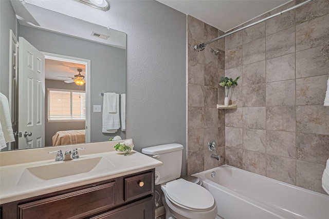 5615 Gemstone Park Rd, Richmond, TX 77407 - full bathroom featuring vanity, ensuite bath, shower / washtub combination, toilet, and a ceiling fan